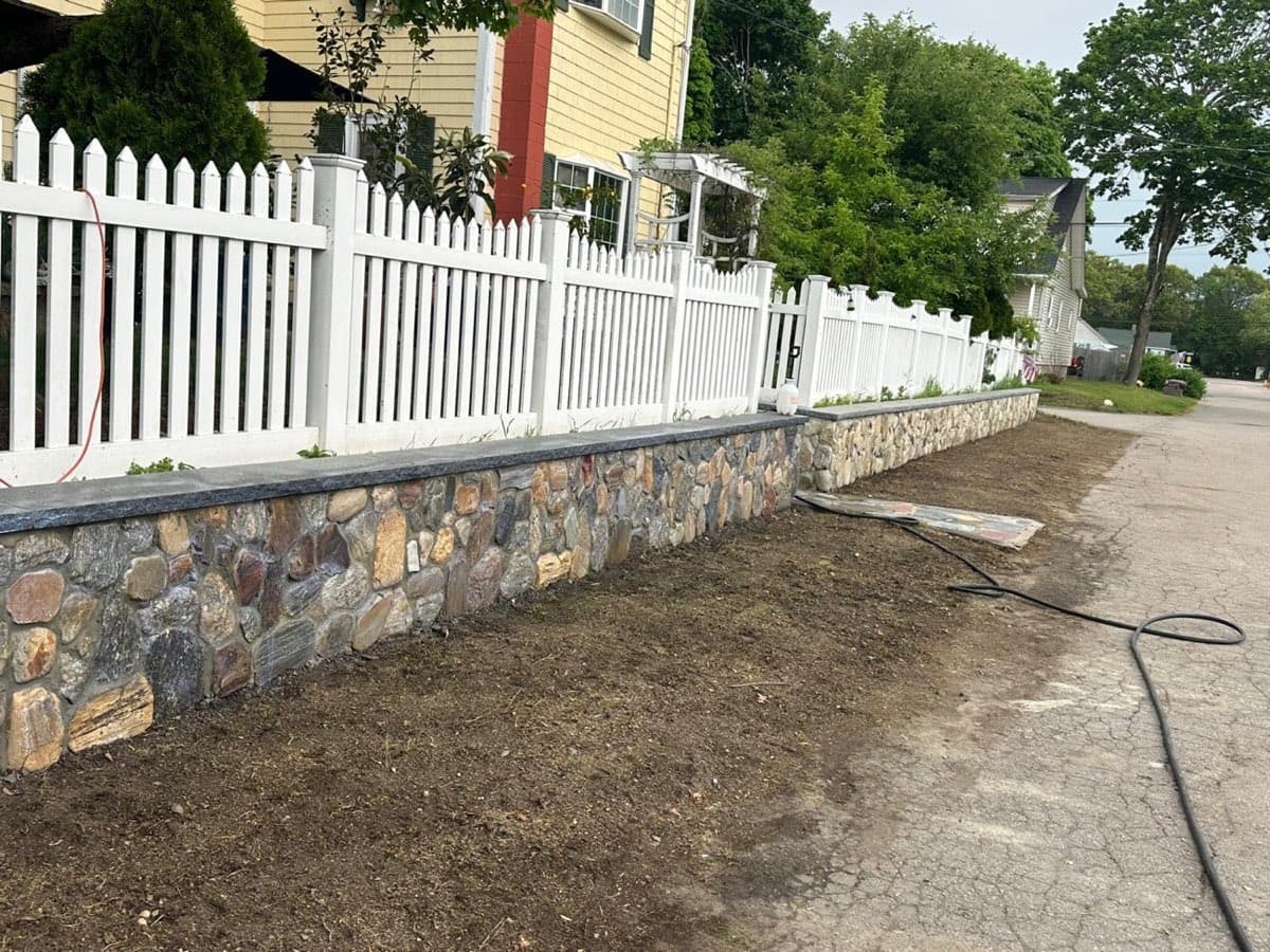 Fieldstone Veneer Wall built by Levi Construction in RI & MA